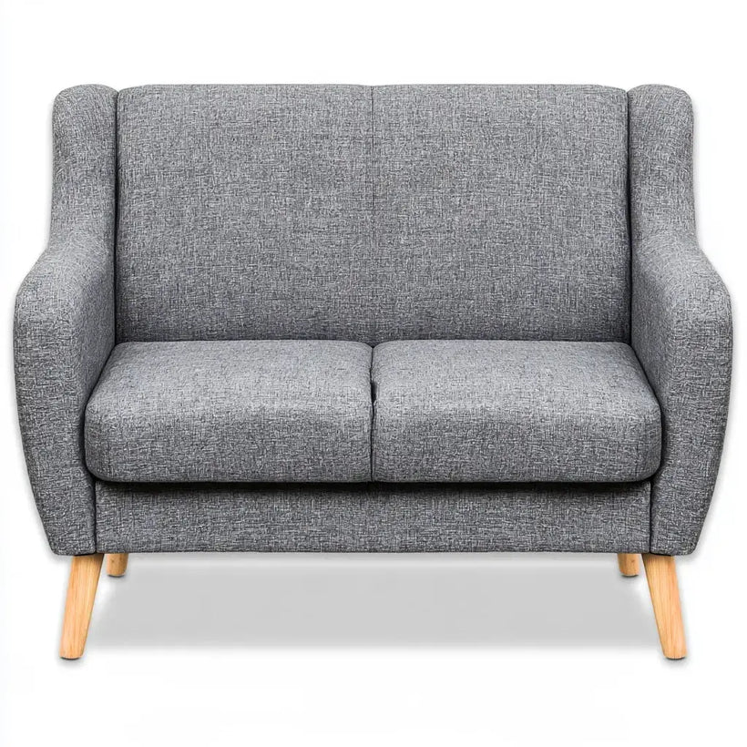 Sofá compacto gris con respaldo continuo de la marca Vardica, estilo moderno y diseño compacto para espacios pequeños.